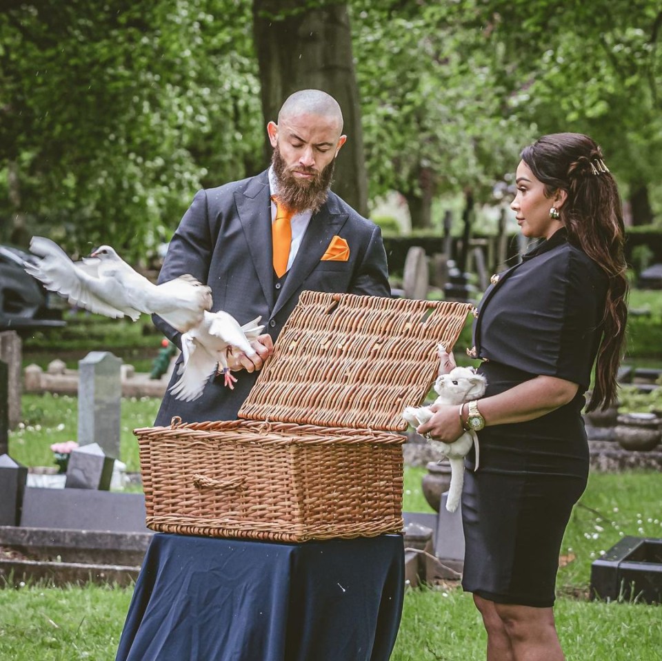 The couple let out doves at her graveside