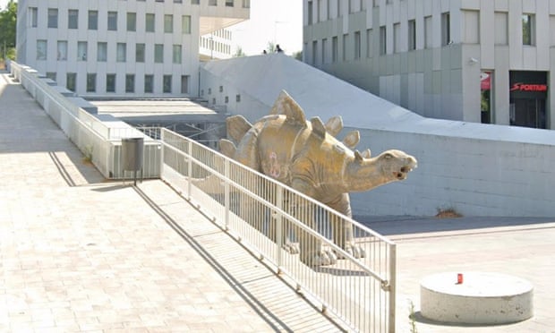 The dinosaur sits outside the Cubic Building in Barcelona