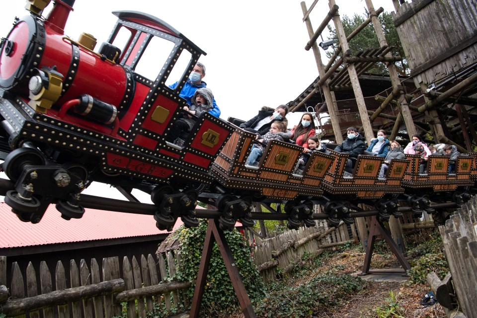 The family were seen enjoying the roller coasters in the Staffordshire park