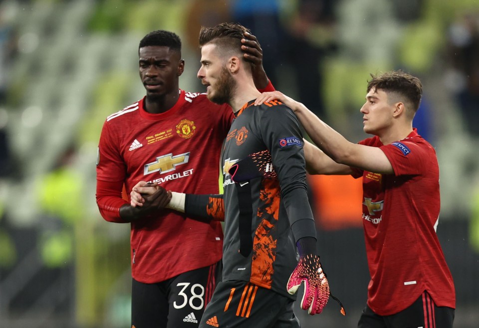 The Spaniard is consoled by Axel Tuanzebe and Dan James