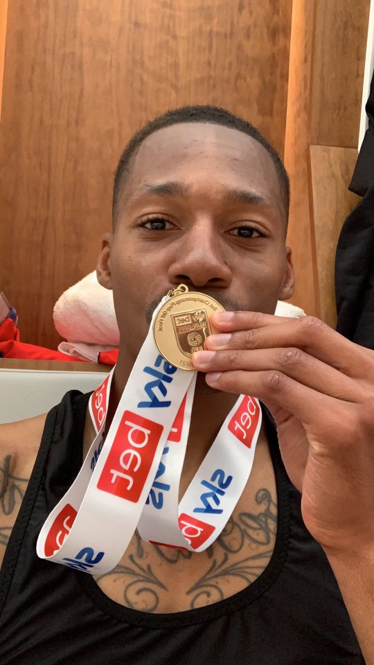 Ethan Pinnock with his Championship play-off winners' medal