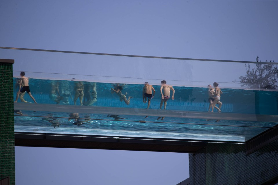 Those who don't have access to a see-through rooftop pool have visited beaches and parks to make the most of the sunshine