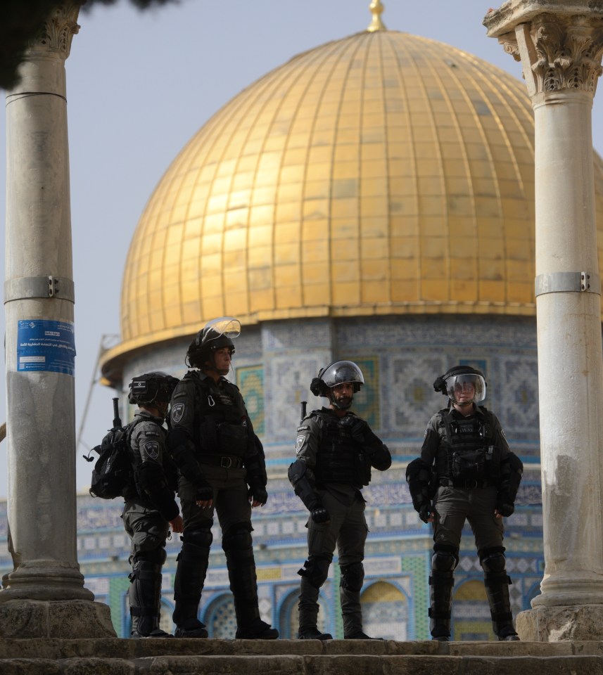 Israeli police stand outside the Al-Aqsa mosque