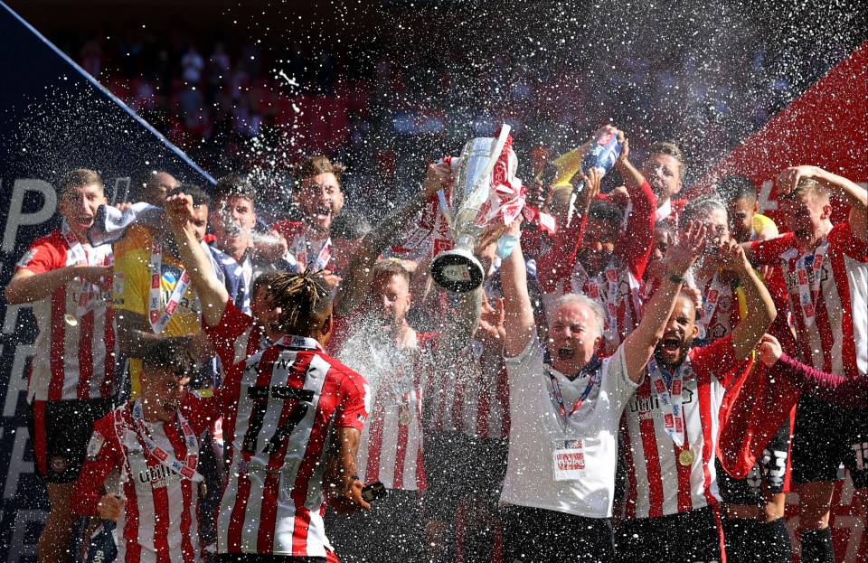 Brentford celebrate getting Premier League football next season