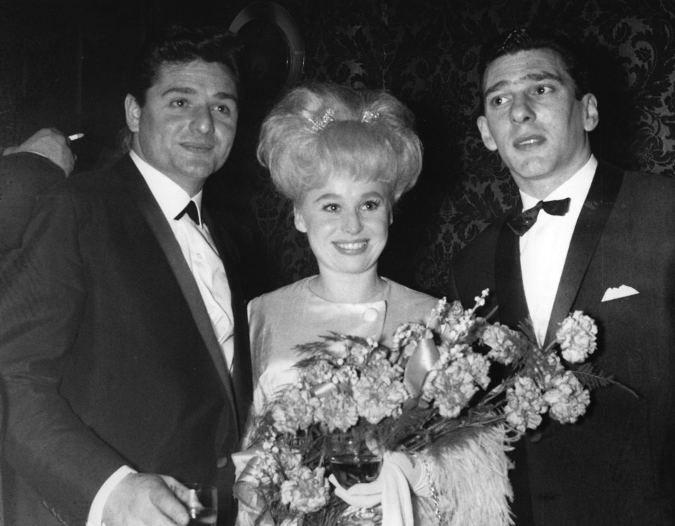 Barbara Windsor with Ronnie Knight and Reggie Kray – who, along with twin Ronnie, had previously threatened to kill her and the cast of a movie she was making