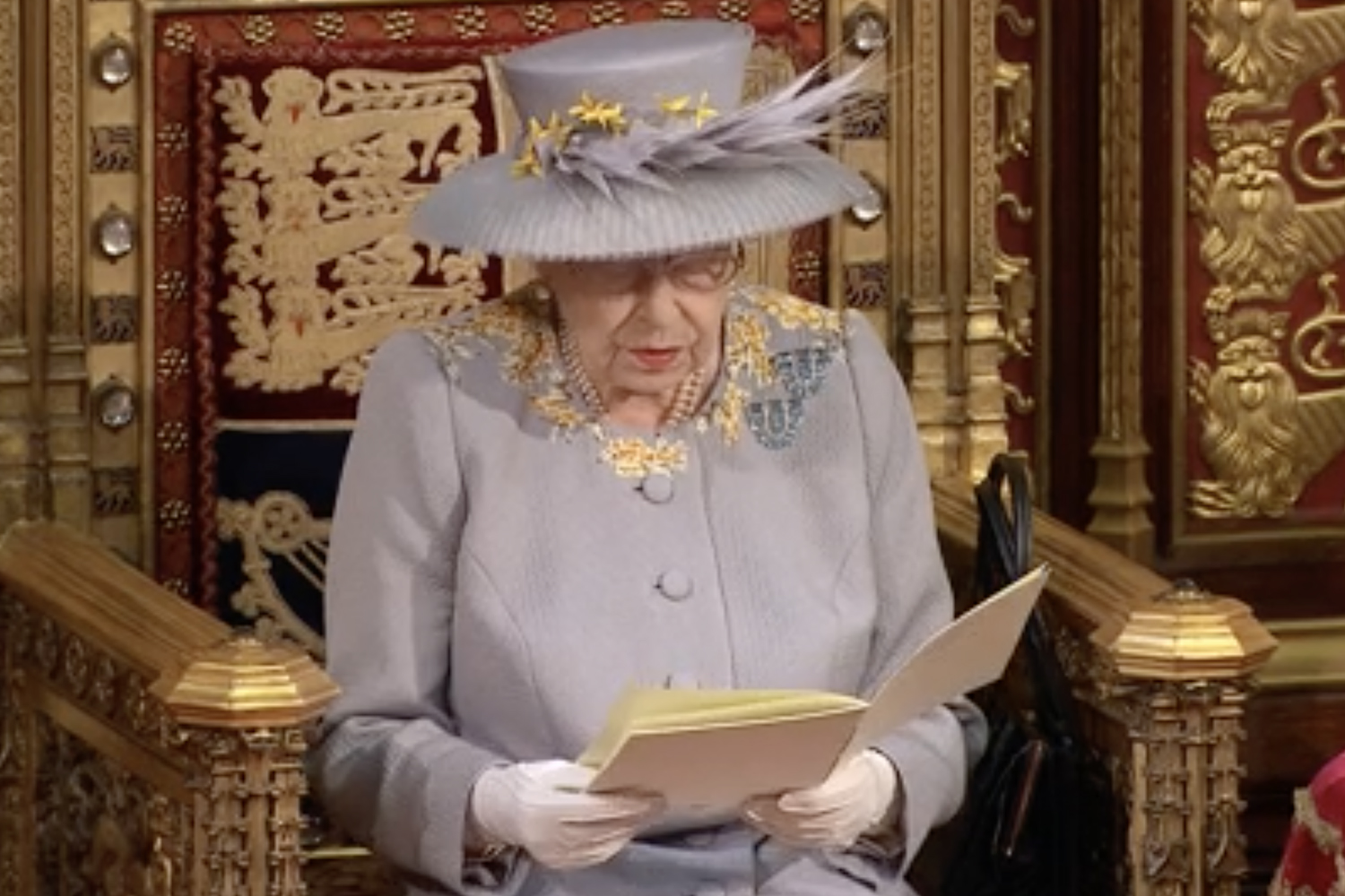 The Queen delivering the speech as she opens Parliament this morning