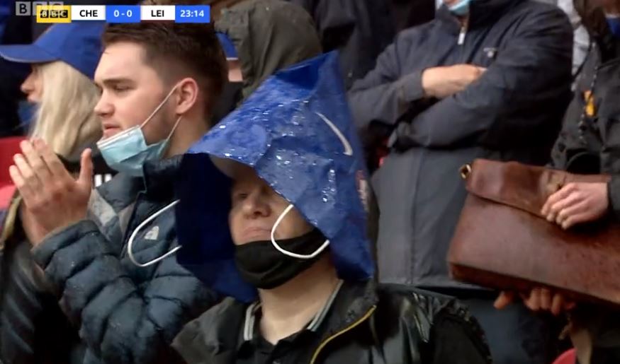 One fan fashioned some impromptu headgear during a first-half downpour