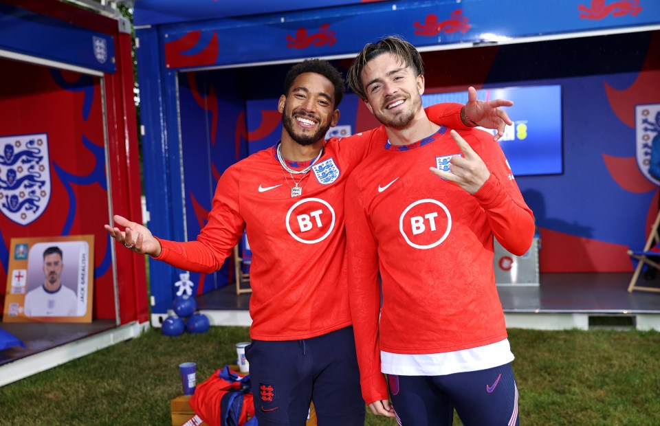 Presenter Josh Denzel and Jack Grealish of England pose for a photograph at St George’s Park