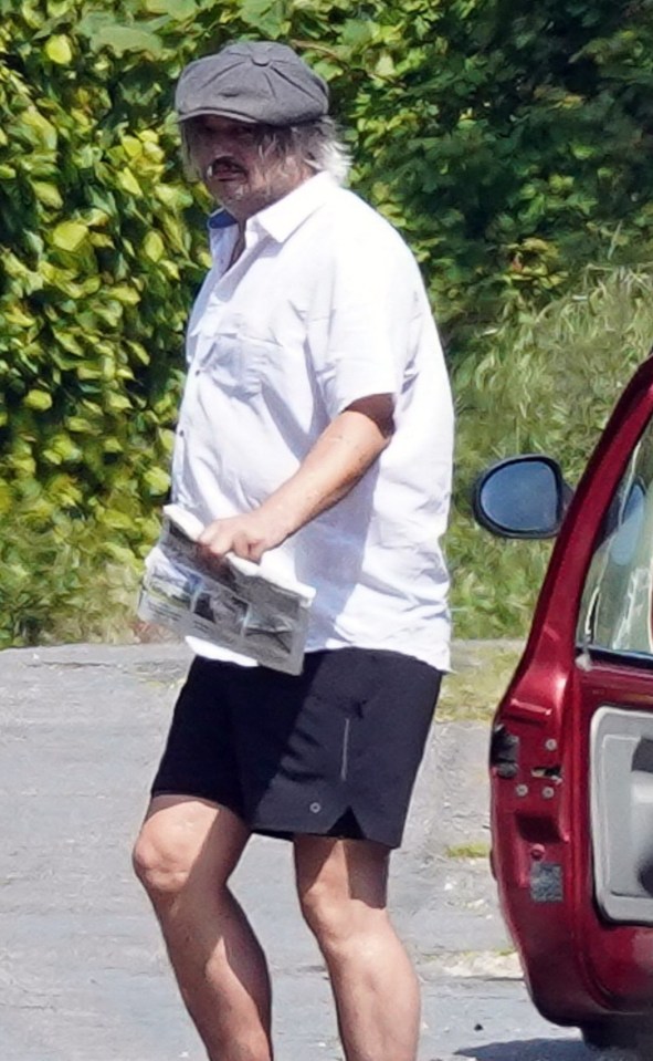 The star, 42, looked relaxed in shorts and a shirt in the Normandy sun