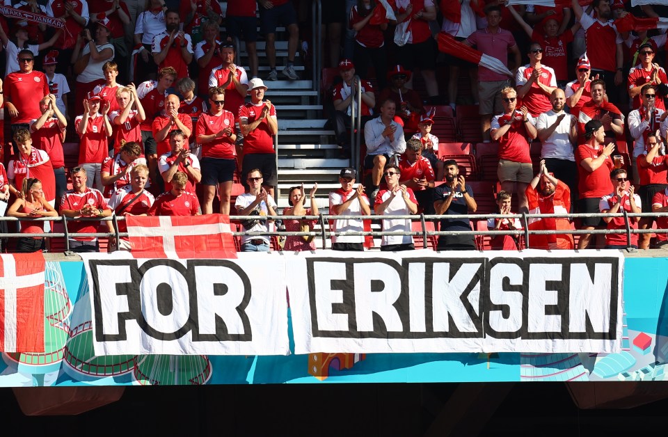 Fans in Copenhagen unveil an Eriksen tribute banner