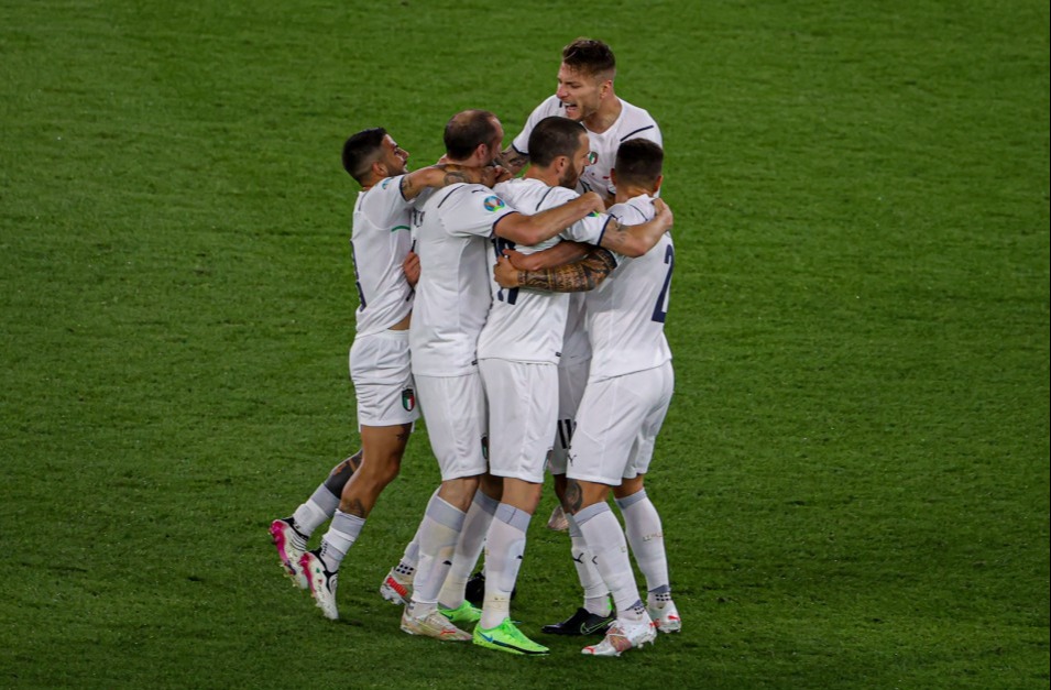 Italy players celebrate their opening goal against Turkey on Friday