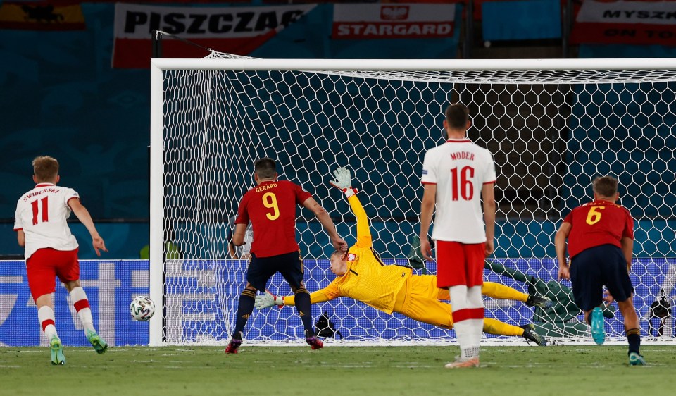 Spain’s Gerard Moreno saw his penalty crash off the post