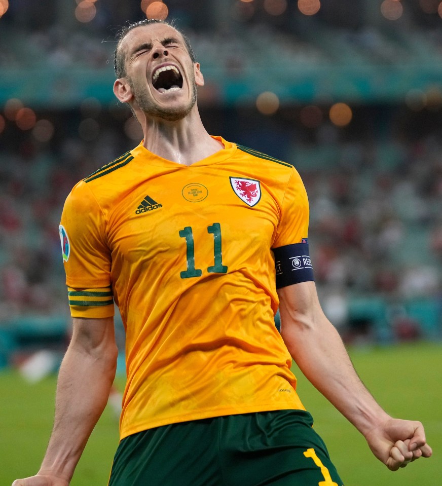 Gareth Bale roars with delight, having set up both Wales goals either side of missing a penalty