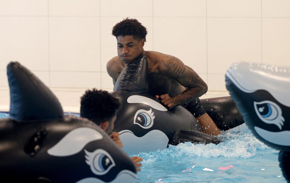 Three Lions star Rashford looked more like a member of the Miami Dolphins at the team’s St George’s Park training base