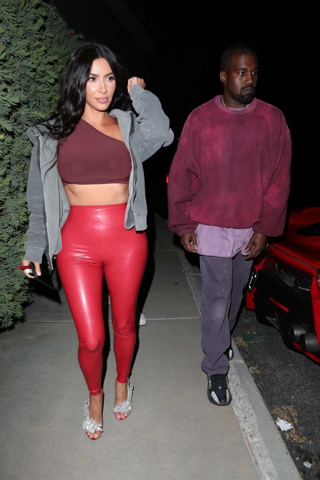 William would have a heart-attack looking at this loungewear zip-up top and PVC-style leggings on Kim K