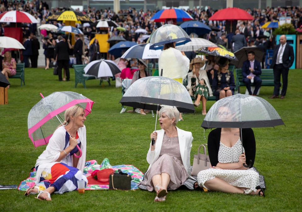 Brolleys could be a popular fashion accessory if rain moves in at Ascot