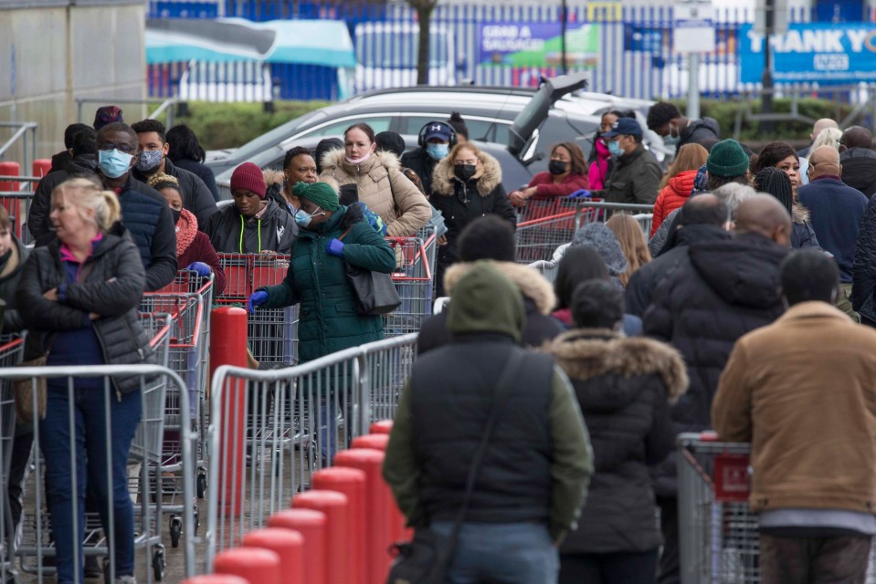 Shoppers queuing up to buy their weekly goods during lockdown