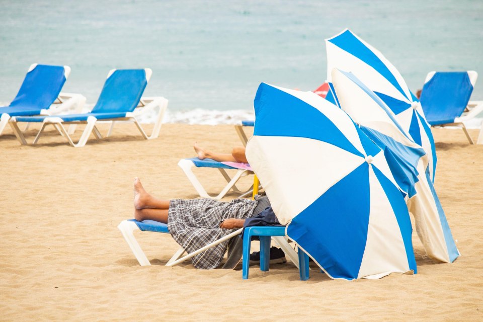 Sun-seekers in the Canary islands, Spain enjoying a well-deserved break