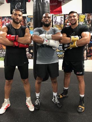 Ahmed Elbiali, left, pictured in the gym with Tommy Fury