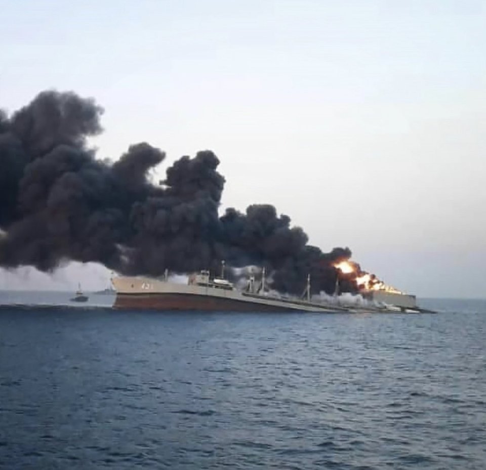 Iran's largest navy ship caught fire after a 'mysterious blast' and sank in the Gulf of Oman this morning