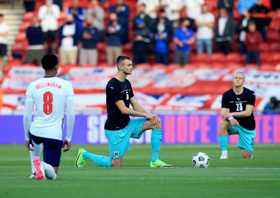 Boos and jeers were heard before they were drowned out by applause as the players took the knee before England vs Austria