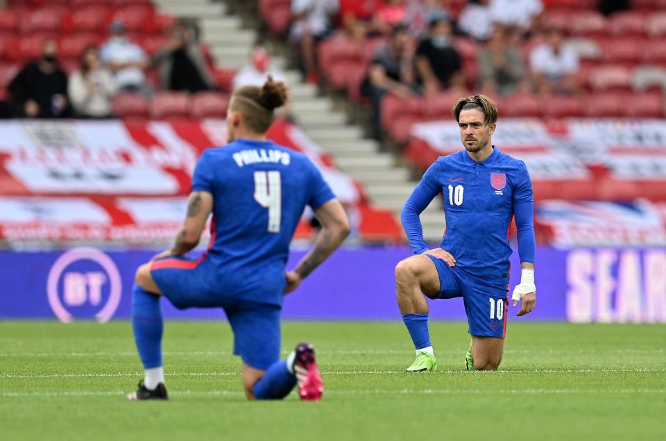 England have been booed by a section of their supporters while taking the knee