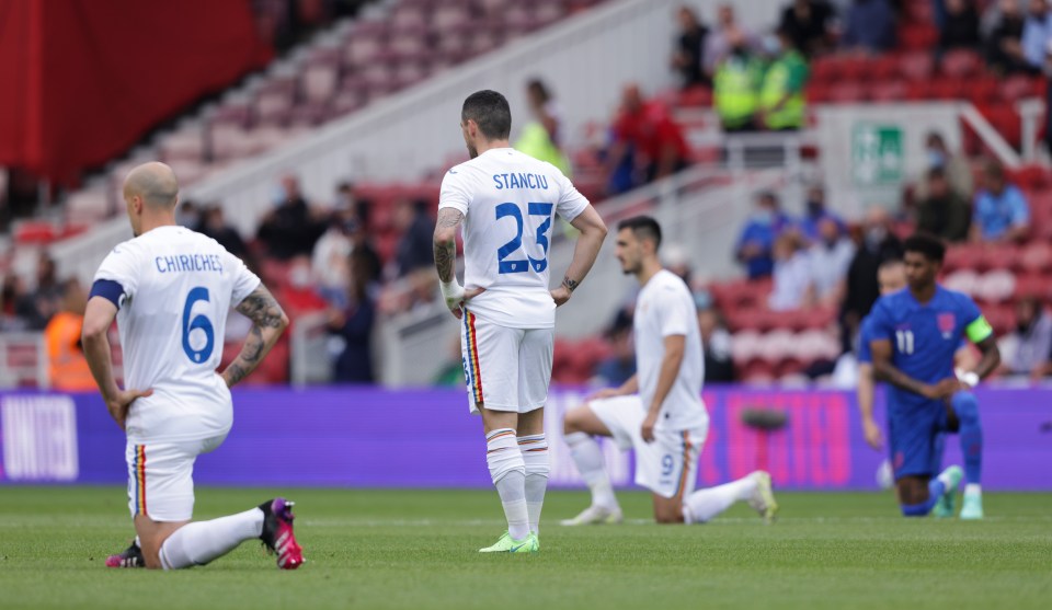 Two Romania players chose not to kneel against England