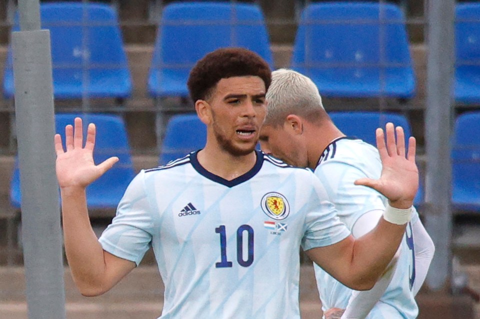 Che Adams says he's been welcomed with open arms and already feels at home with Scotland