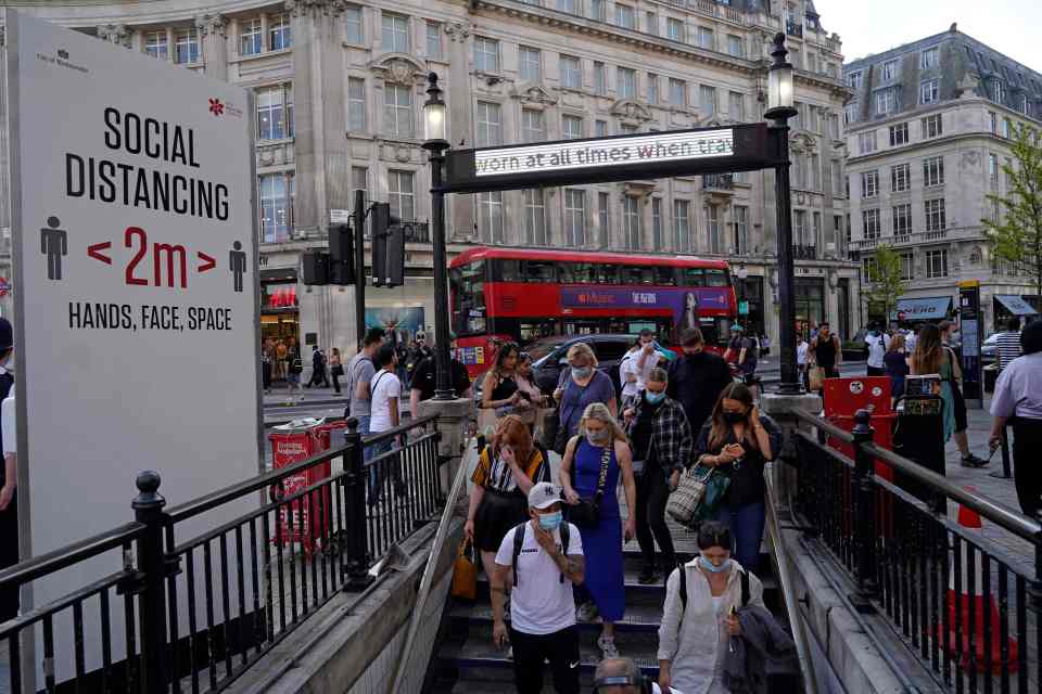 Shoppers out and about earlier in the months in London as restrictions remain in place