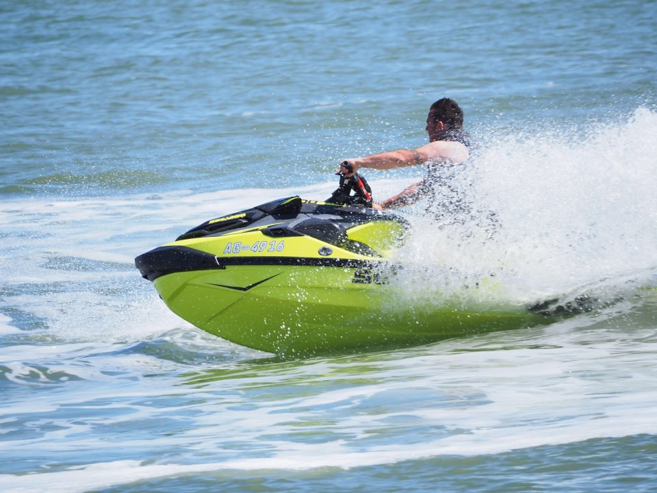 A jetskiier hits the water