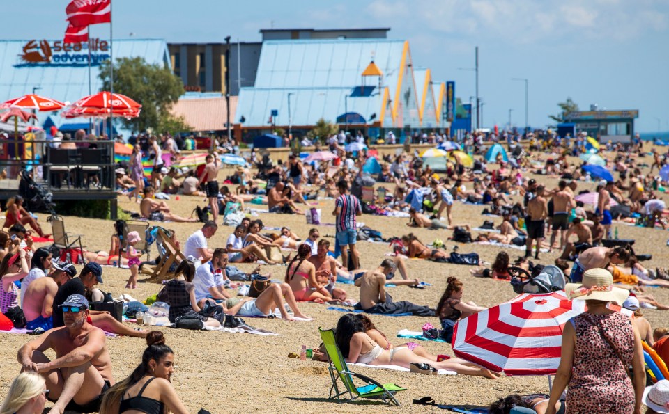 People soaking up rays in Southend, Essex, yesterday