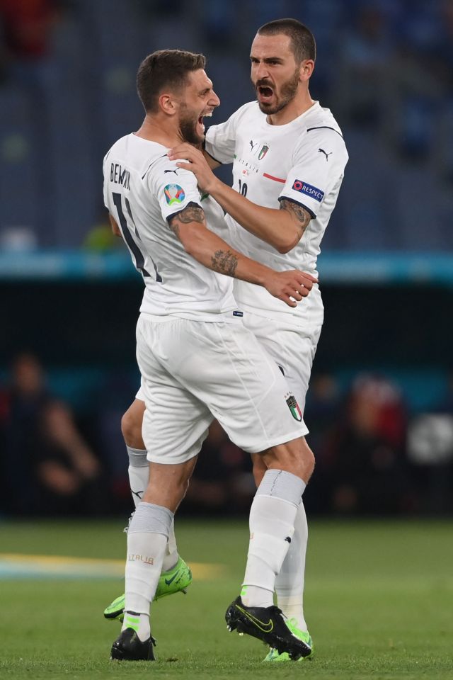 Domenico Berardi and Leonardo Bonucci celebrate after Merih Demiral's own goal