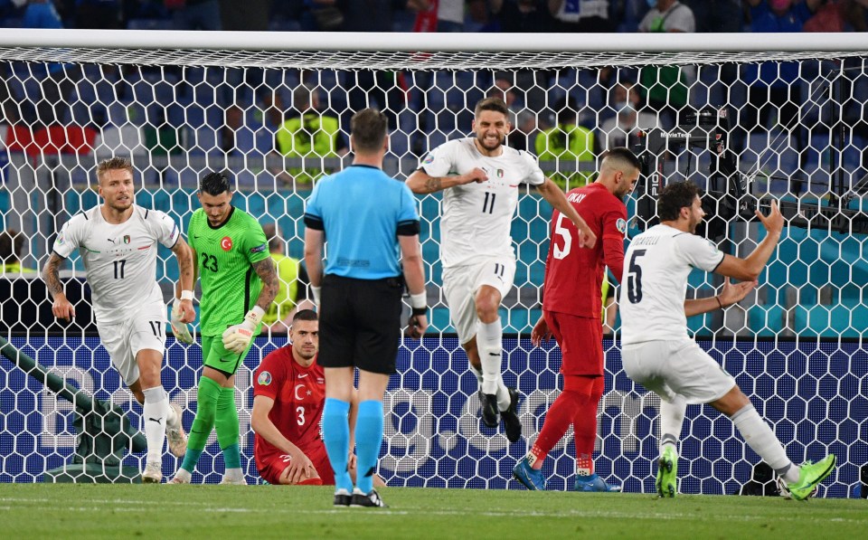 Turkey's Merih Demiral (No3) looks heartbroken after scoring his own goal