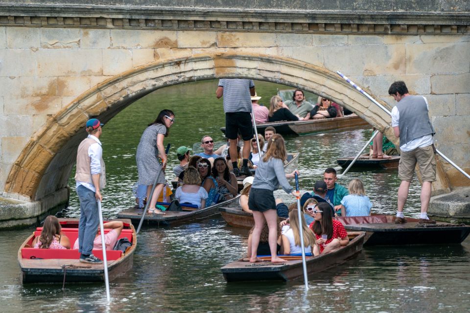 People enjoy punt tours along the River Cam in Cambridge