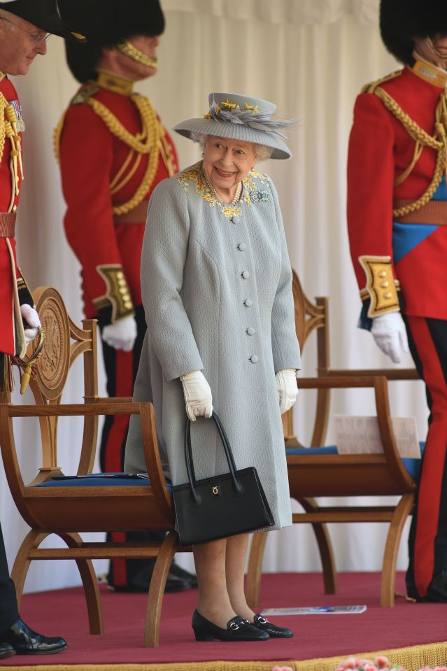 The Queen was seen smiling throughout