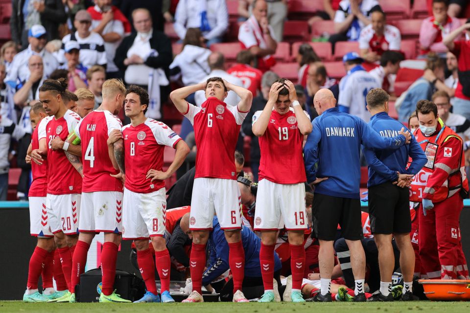 Emotional Danish players created a ring around Eriksen while he was being treated