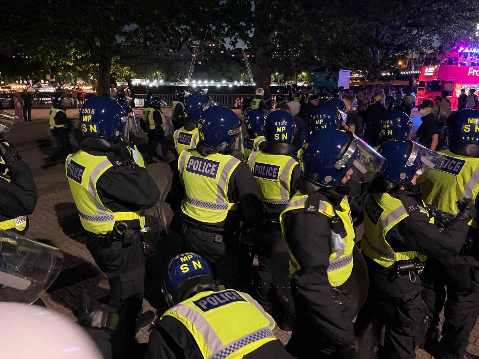 Cops were pelted with missiles near the London Eye last night