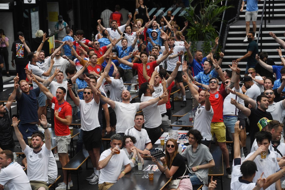 Fans cheer on England in Box Park in Wembley as they kick off