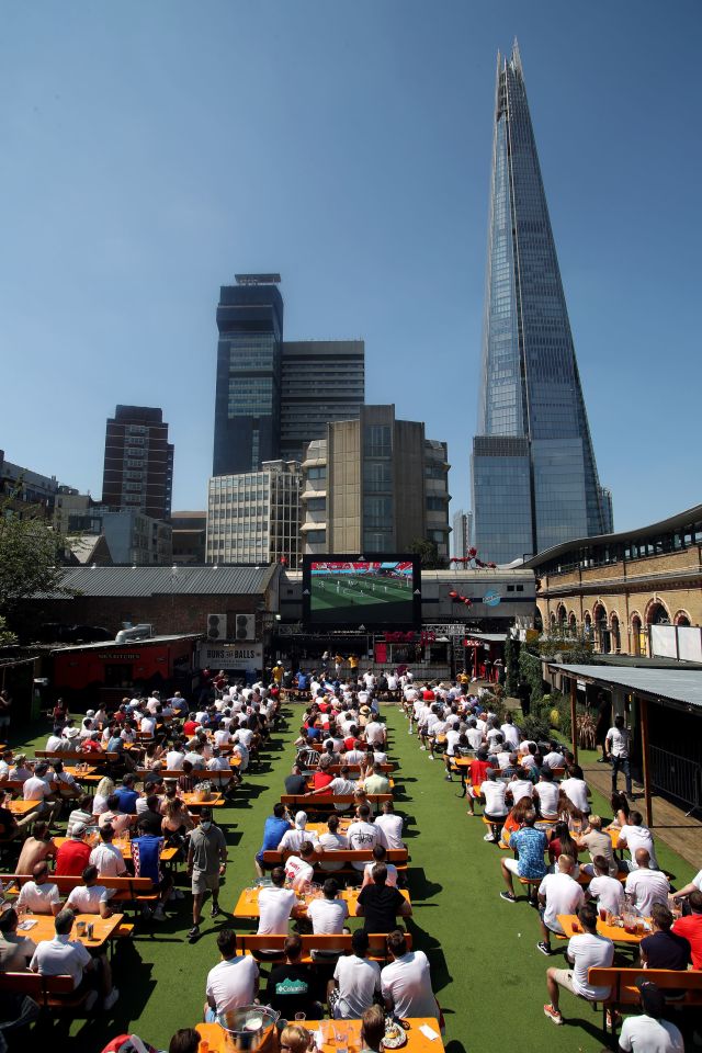 Fans watch on the big screen at London's Vinegar Yard