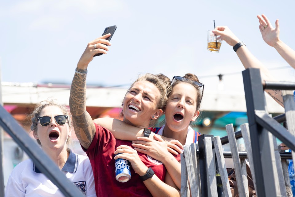 Fans in London celebrate as England top the table