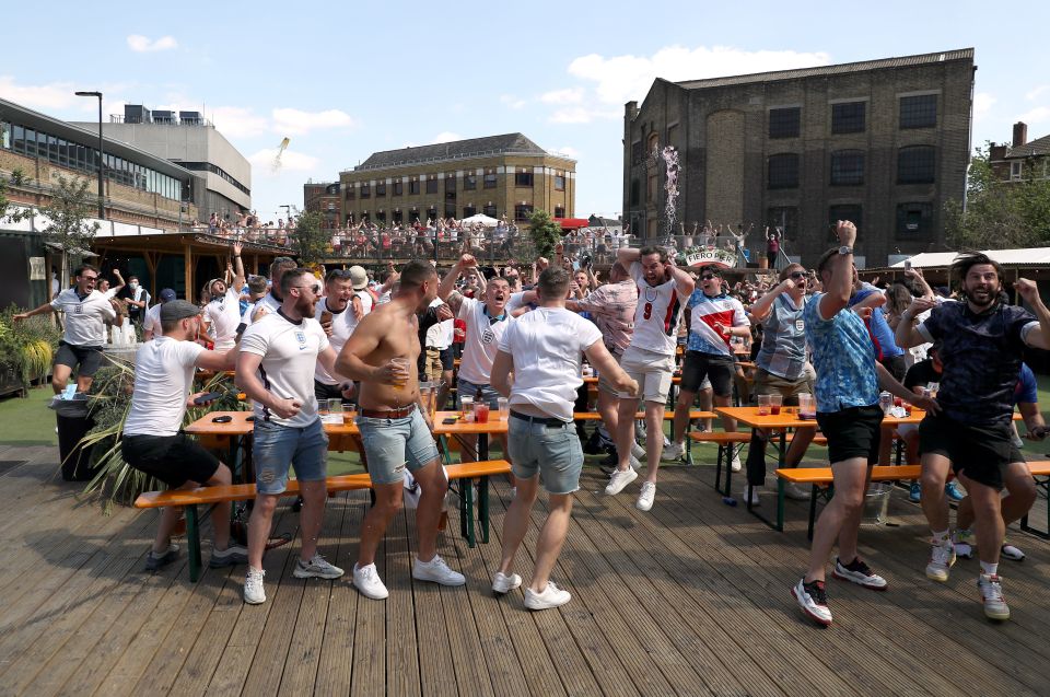 England fans celebrate Raheem Sterling's opener