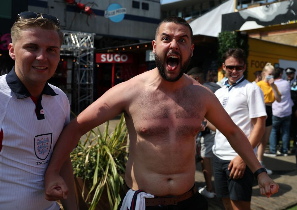 A fan shows off his waxed chest as he celebrates in Vinegar Yard