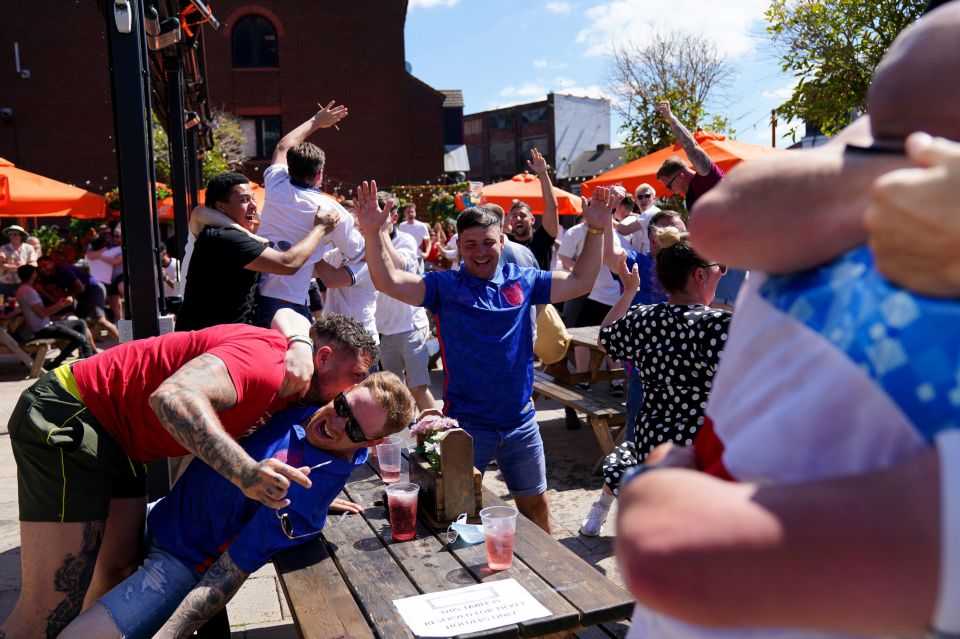 Bars packed with supporters erupted as England won