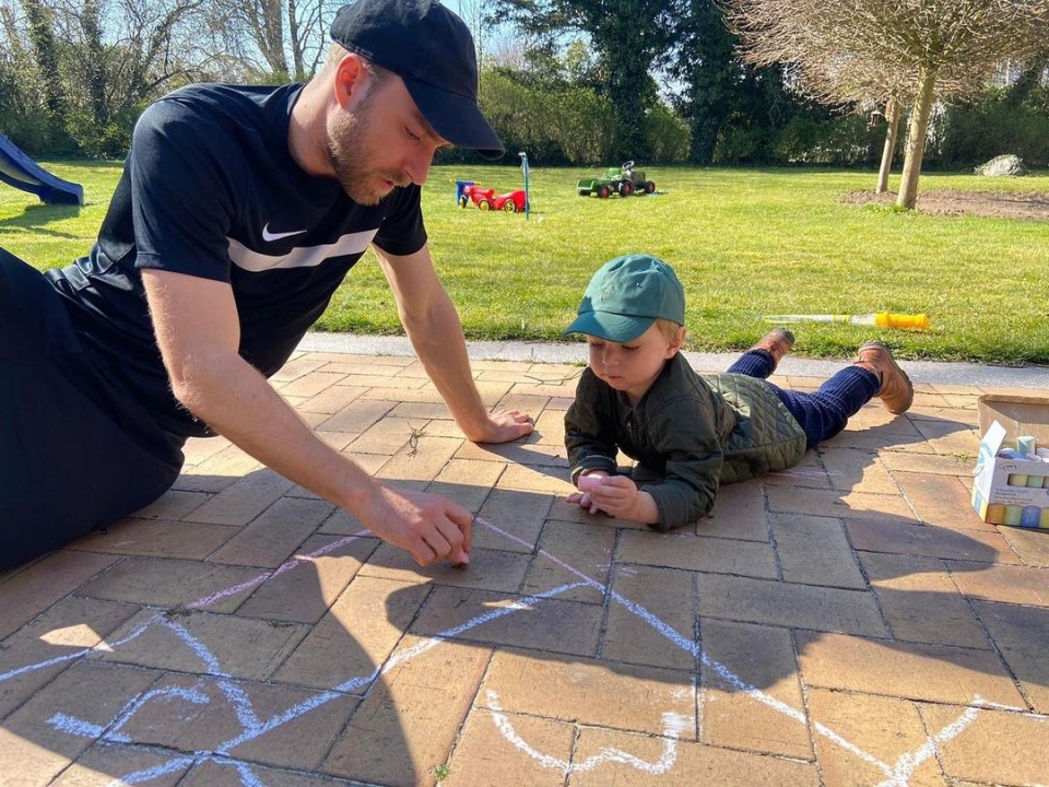 Christian shares a sweet moment with Alfie, three