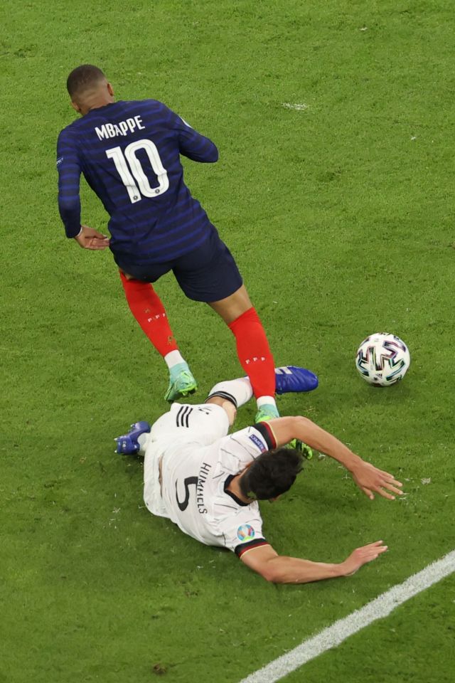 Kylian Mbappe was denied by this sliding challenge from Mats Hummels, which left most of France screaming in vain for a penalty