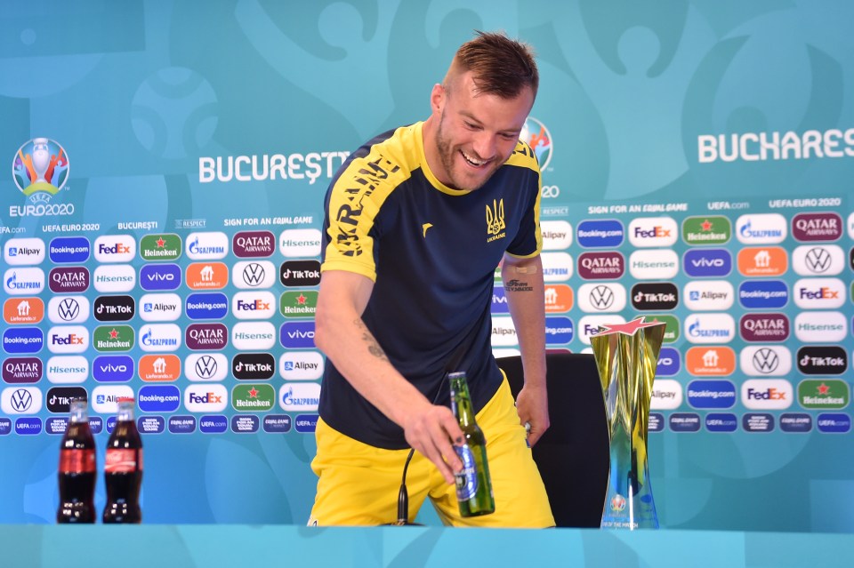 Yarmolenko spotted the Heineken and Coca-Cola bottles at his press conference