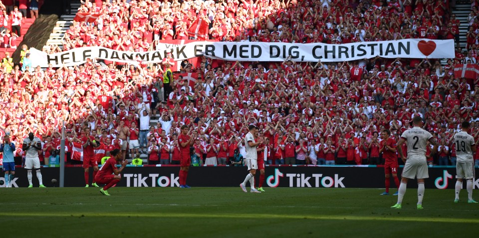 Denmark and Belgium players stopped to pay tribute to Christian Eriksen