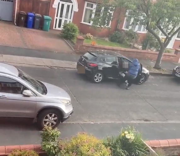 A mum was dragged from her car at knifepoint while her son was in the back