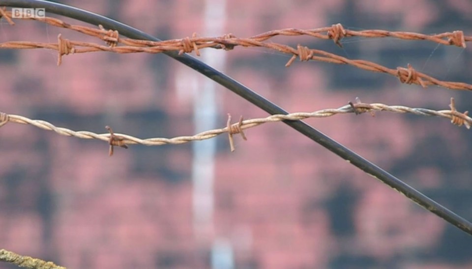 The fences were coated in barbed wire and warning signs