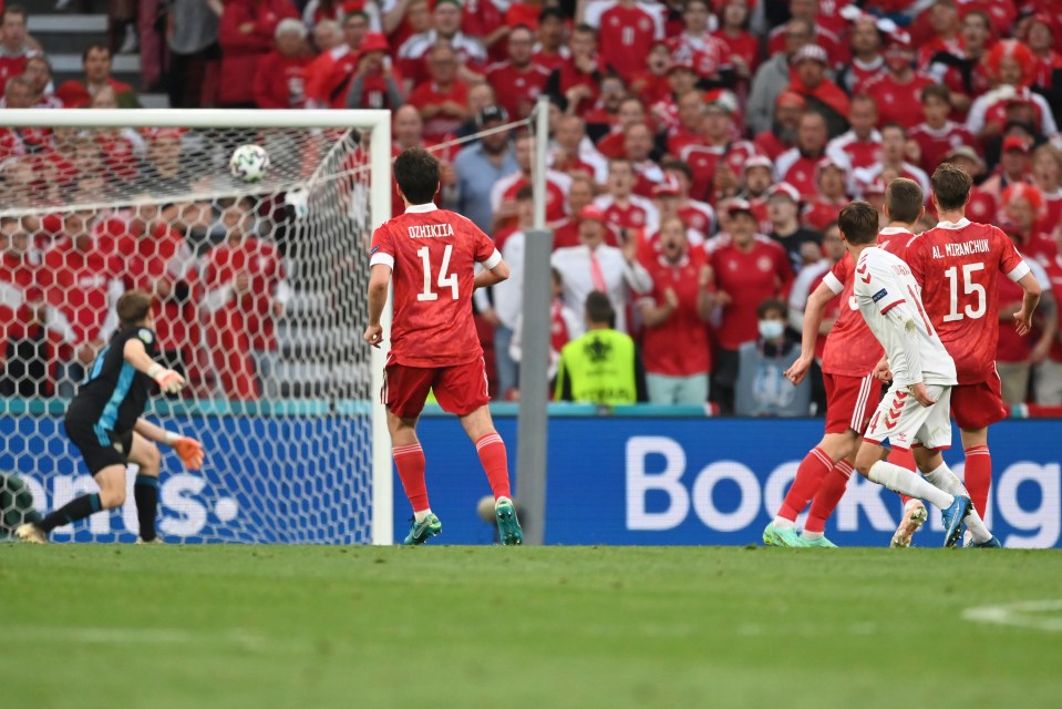 Russia look on in vain as Mikkel Damsgaard arrows the ball into the top corner